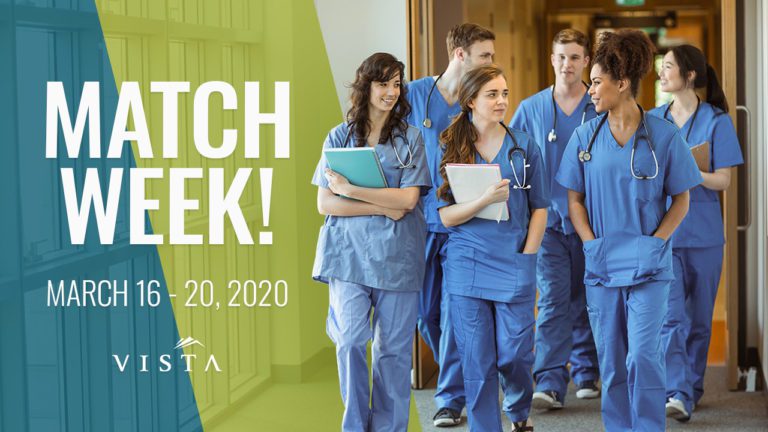 Group of medical students walking down hallway