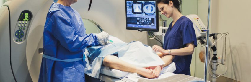 MRI machine with doctor, nurse and patient