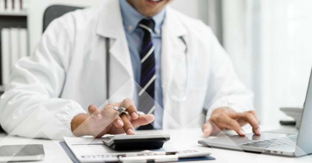 locum tenens physician using a calculator to maximize his income