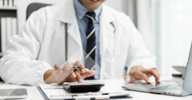 locum tenens physician using a calculator to maximize his income