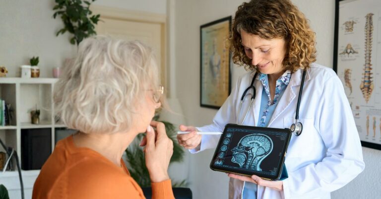 Neurologist reviewing brain MRI results with patient to address neurology staffing shortage in hospitals